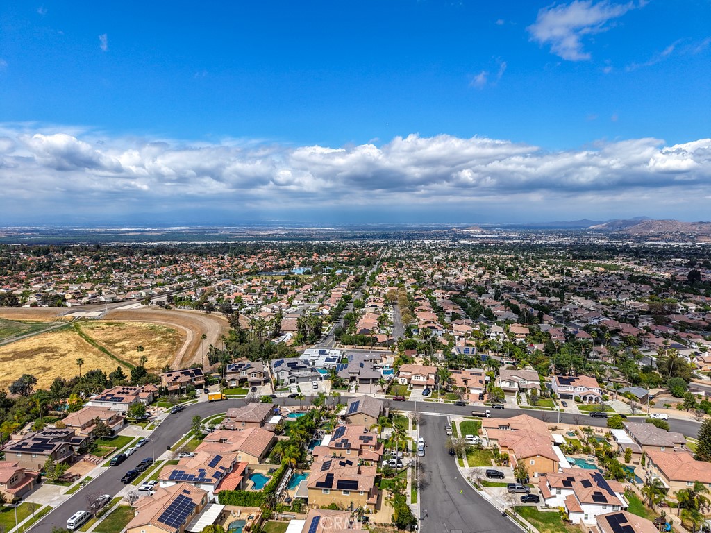 3250 Quartz Circle Corona, CA 92882 - Photo 63 of 68 an aerial view of residential building with yard