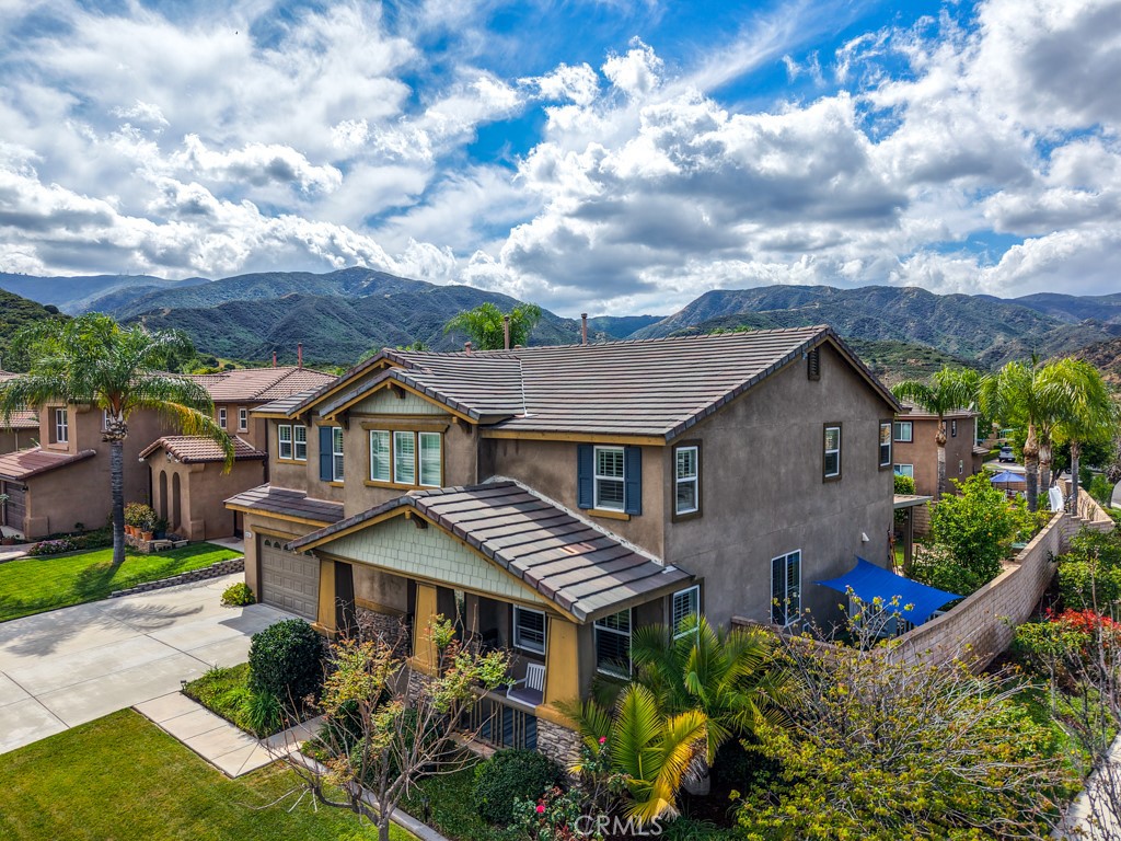 3250 Quartz Circle Corona, CA 92882 - Photo 65 of 68 a front view of a house with a garden