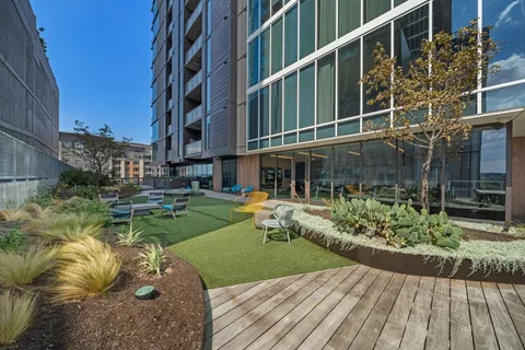 a view of swimming pool with outdoor seating