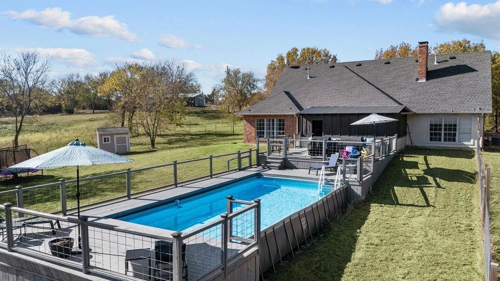 831 Union Hill Road Ennis, TX 75119 - Photo 28 of 36 a view of a chairs and table on the terrace