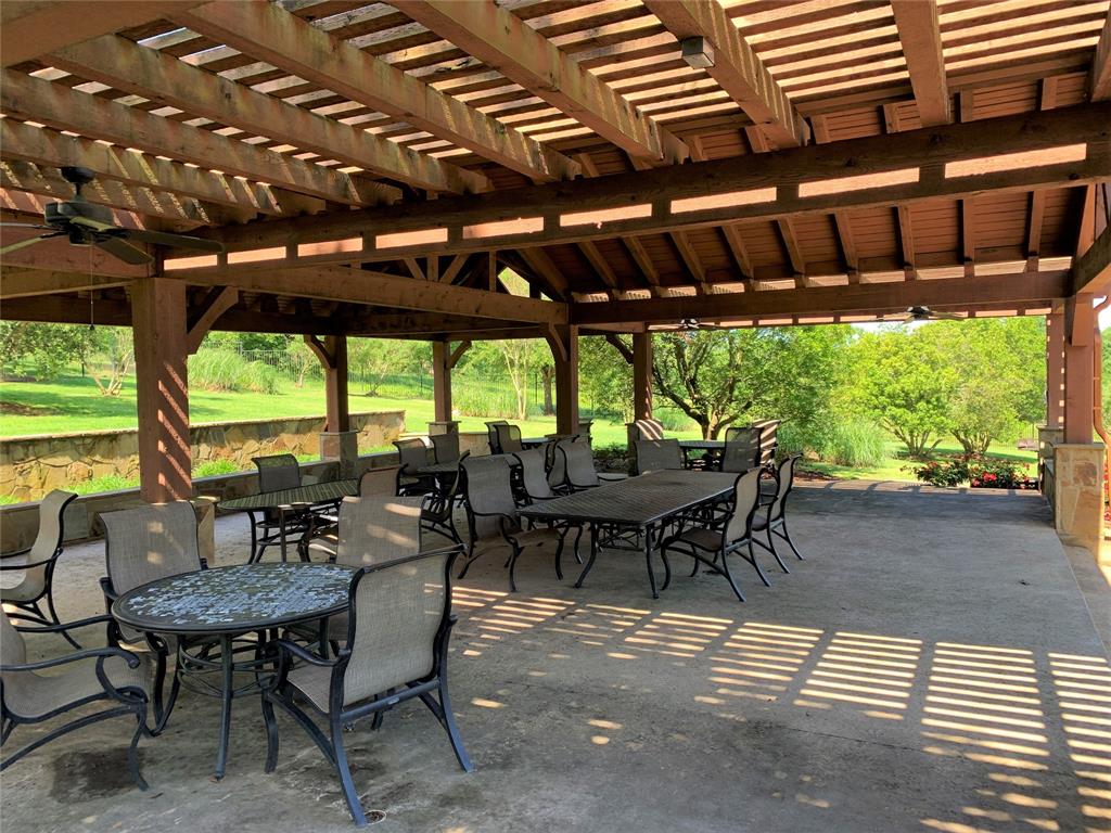Lot 262 High Point Court Athens, TX 75752 - Photo 12 of 17 a dining room with furniture and a garden