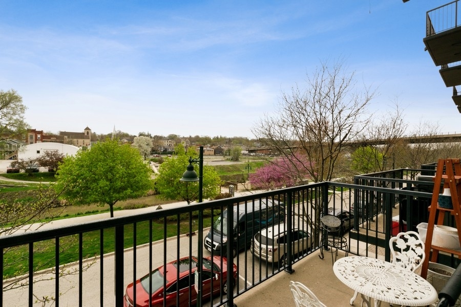 339 Front Street, Unit 2207 Lemont, IL 60439 - Photo 22 of 27 a view of a balcony with lake view