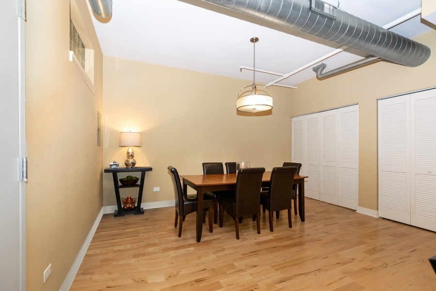 339 Front Street, Unit 2207 Lemont, IL 60439 - Photo 9 of 27 a view of a dining room with furniture