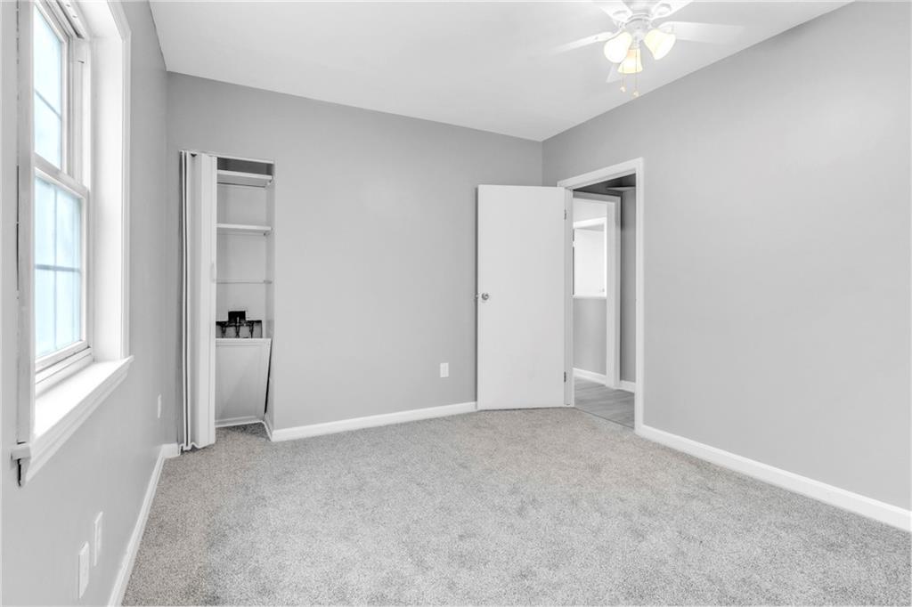 530 Griffin Street Pittsburgh, PA 15211 - Photo 16 of 41 an empty room with windows and closet