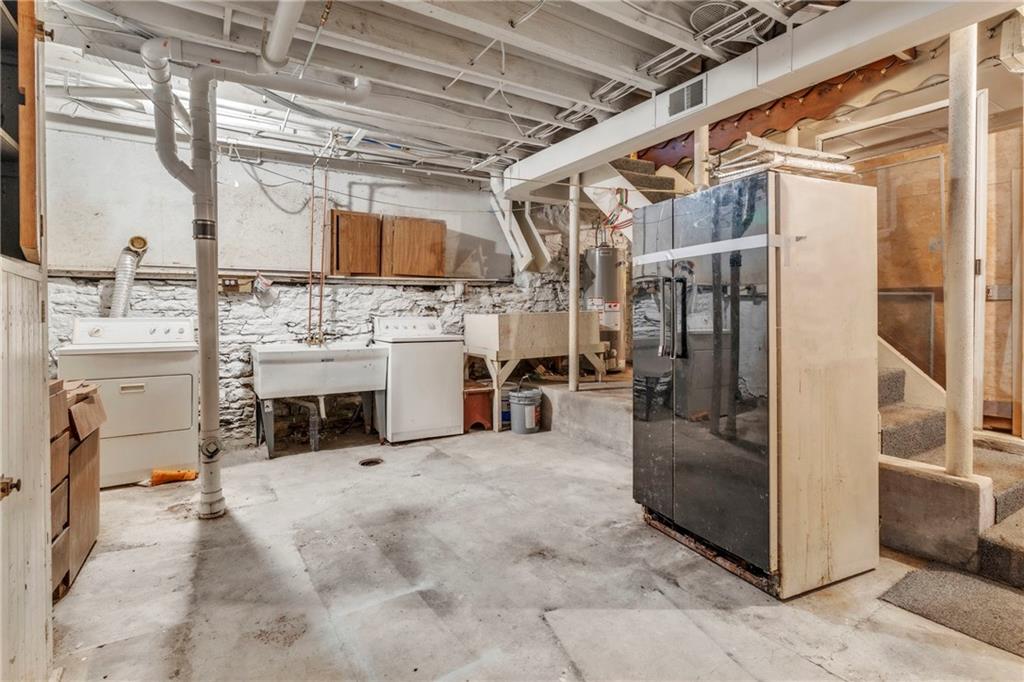 530 Griffin Street Pittsburgh, PA 15211 - Photo 31 of 41 a view of a kitchen with furniture and a fireplace