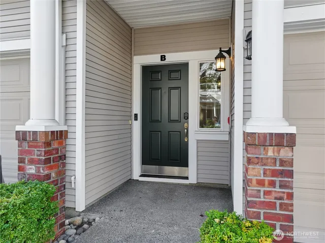 a front view of a house with a garage