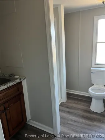 a bathroom with a sink and a toilet