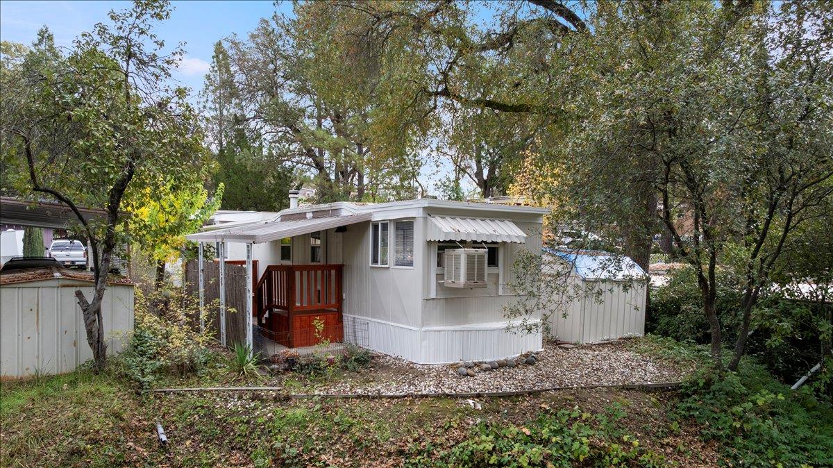 1525 Cold Springs Road, Unit 82 Placerville, CA 95667 - Photo 2 of 20 a front view of a house with a yard
