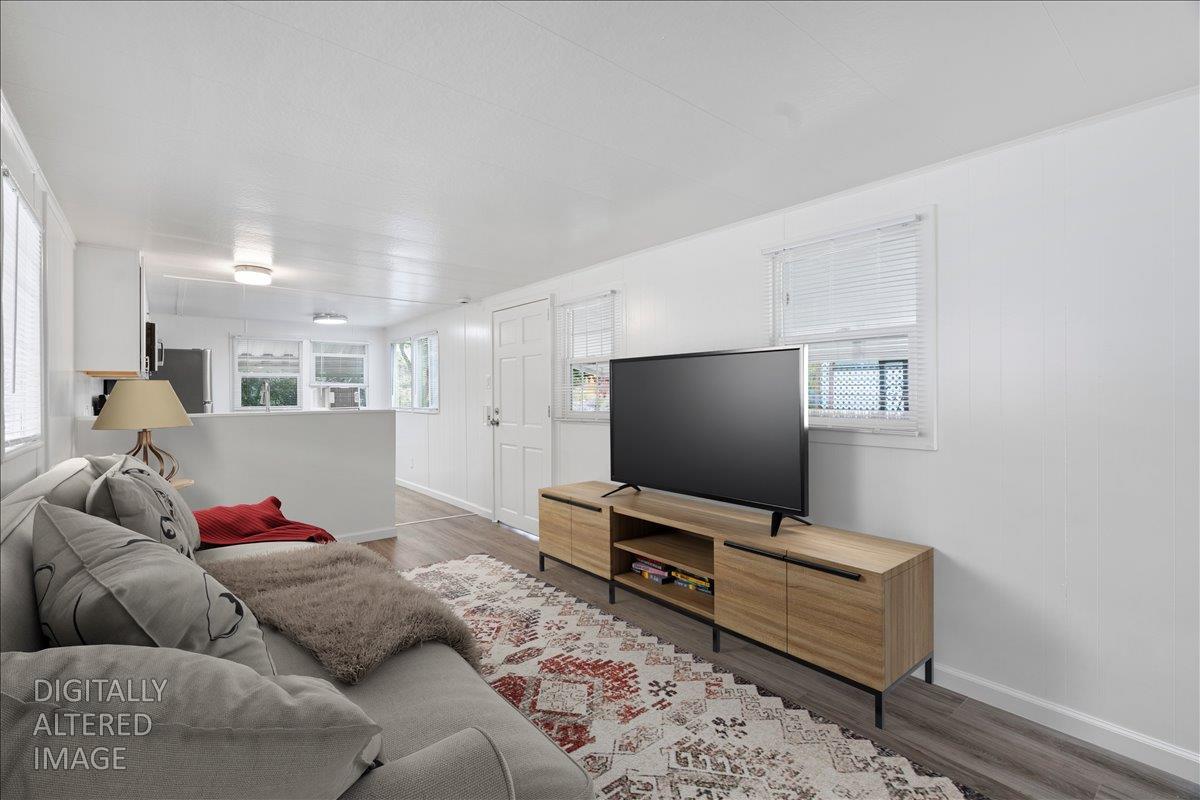 1525 Cold Springs Road, Unit 82 Placerville, CA 95667 - Photo 6 of 20 a living room with furniture and a flat screen tv