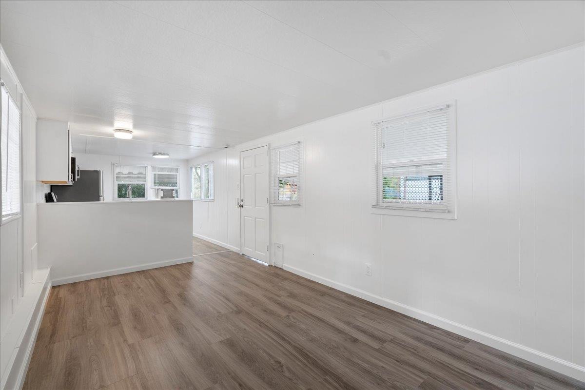 1525 Cold Springs Road, Unit 82 Placerville, CA 95667 - Photo 8 of 20 a view of a kitchen with wooden floor and a kitchen