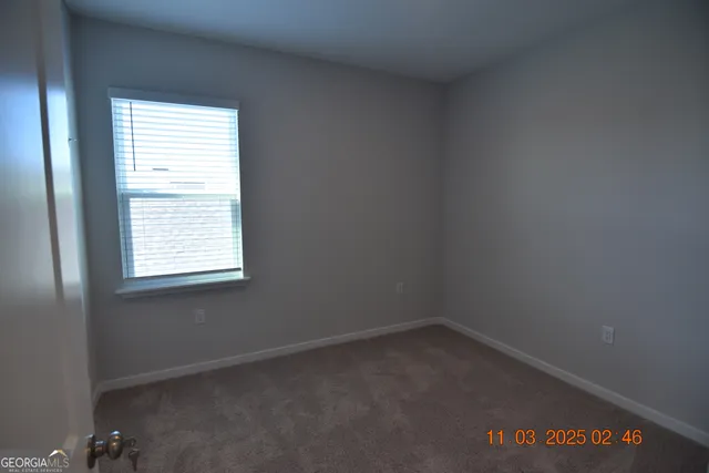 an empty room with a window