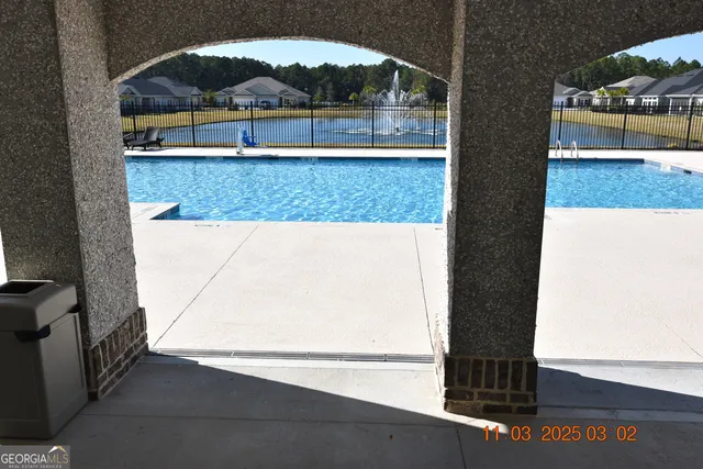 view of living room with a bed