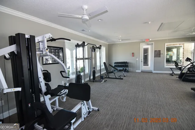 a living room with furniture window and a flat screen tv