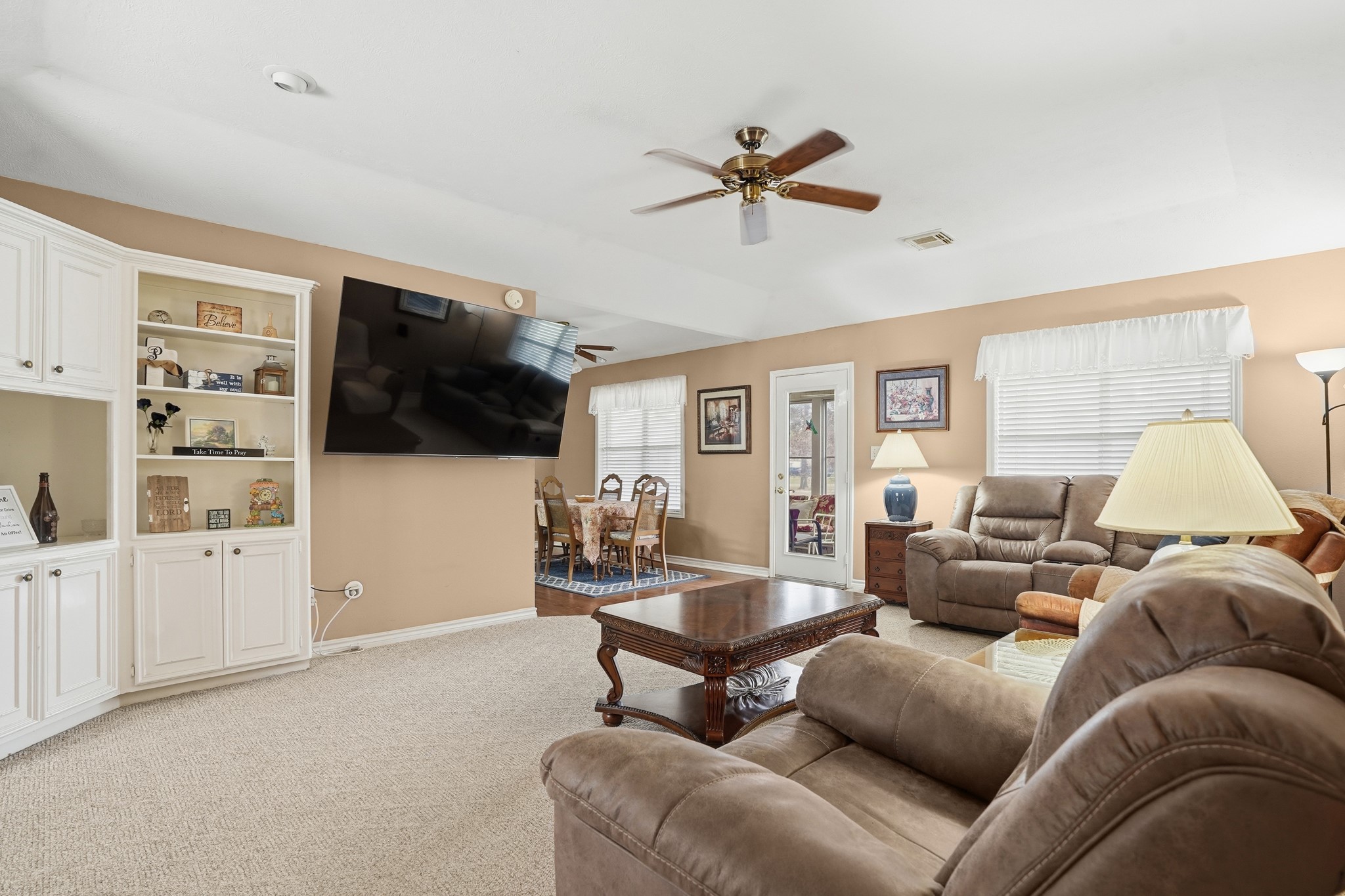 281 Broadmoor Street Trinity, TX 75862 - Photo 8 of 19 a living room with furniture and a flat screen tv