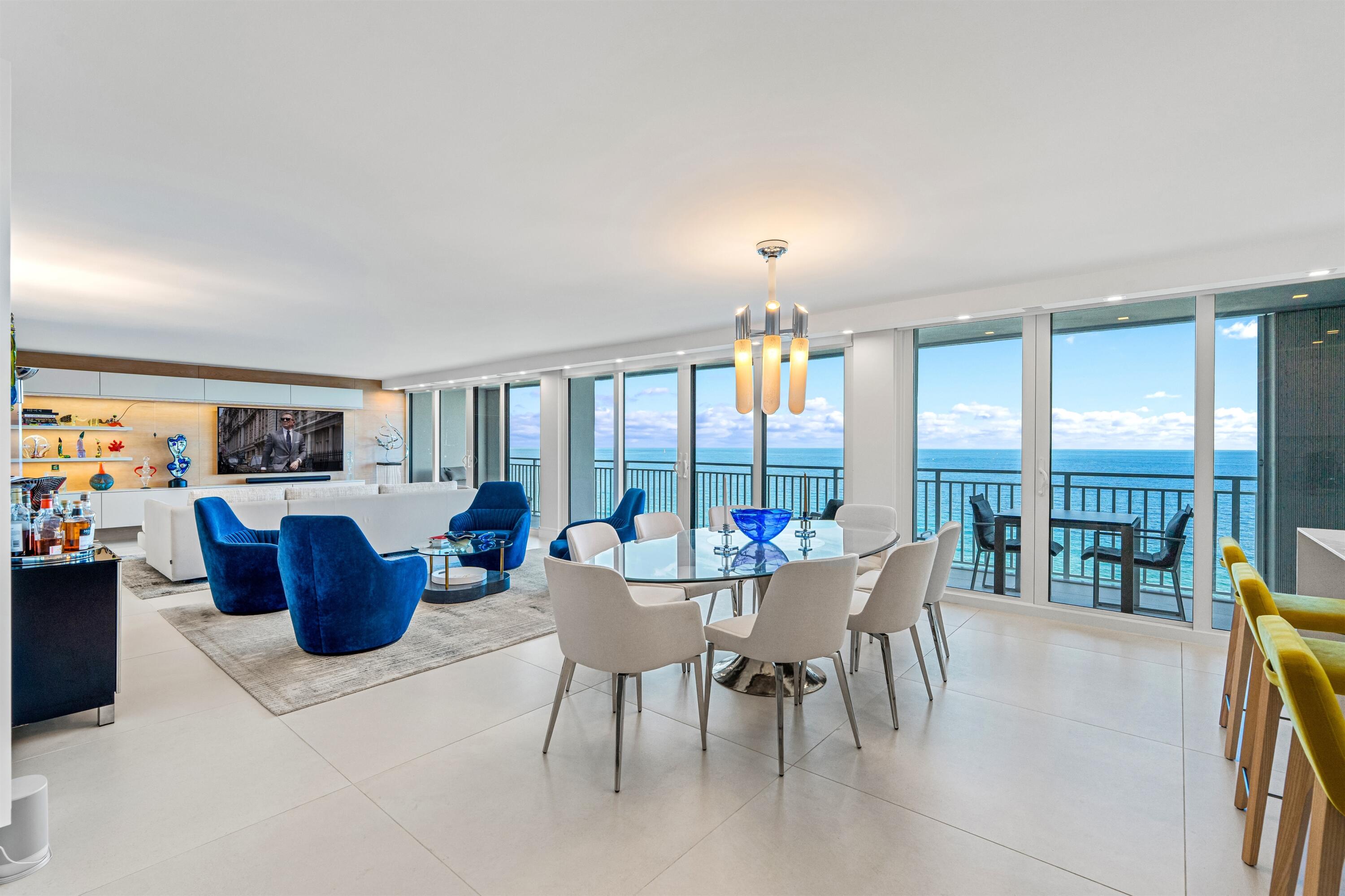 2600 South Ocean Boulevard, Unit 19E Boca Raton, FL 33432 - Photo 2 of 53 a living room with furniture and a large window