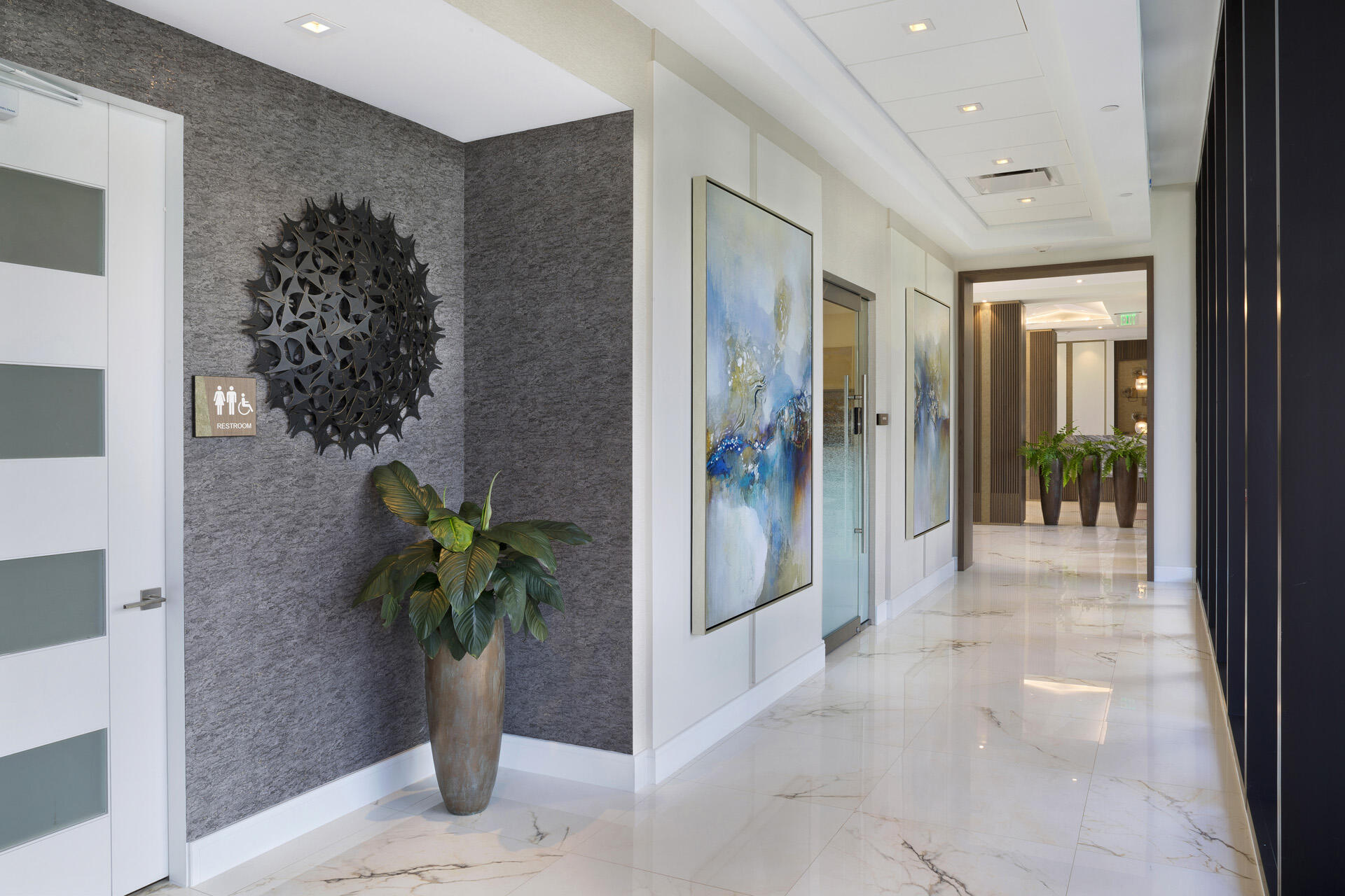 2600 South Ocean Boulevard, Unit 19E Boca Raton, FL 33432 - Photo 39 of 53 a view of a hallway with potted plant in front of a room