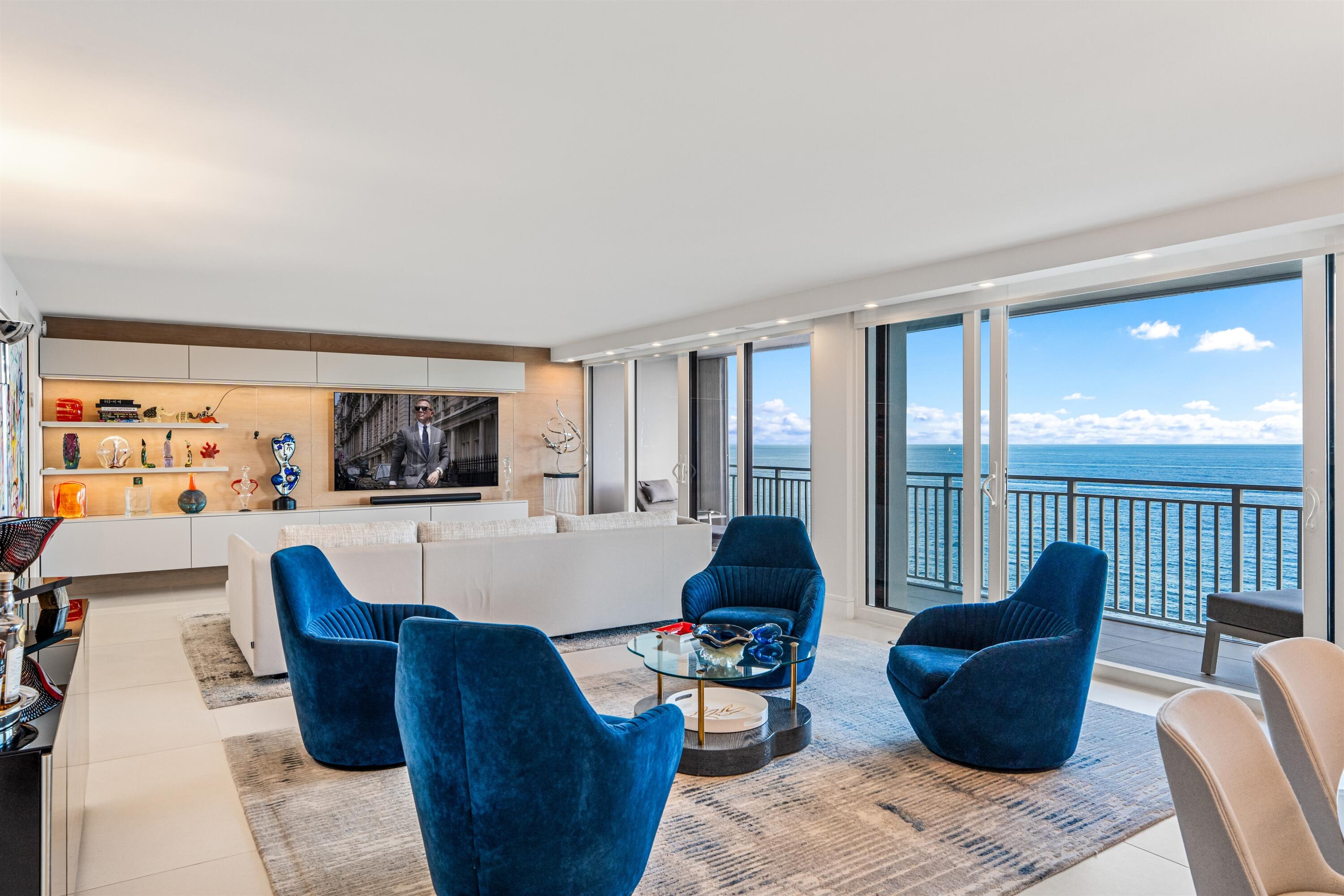 2600 South Ocean Boulevard, Unit 19E Boca Raton, FL 33432 - Photo 4 of 53 a living room with furniture and a large window