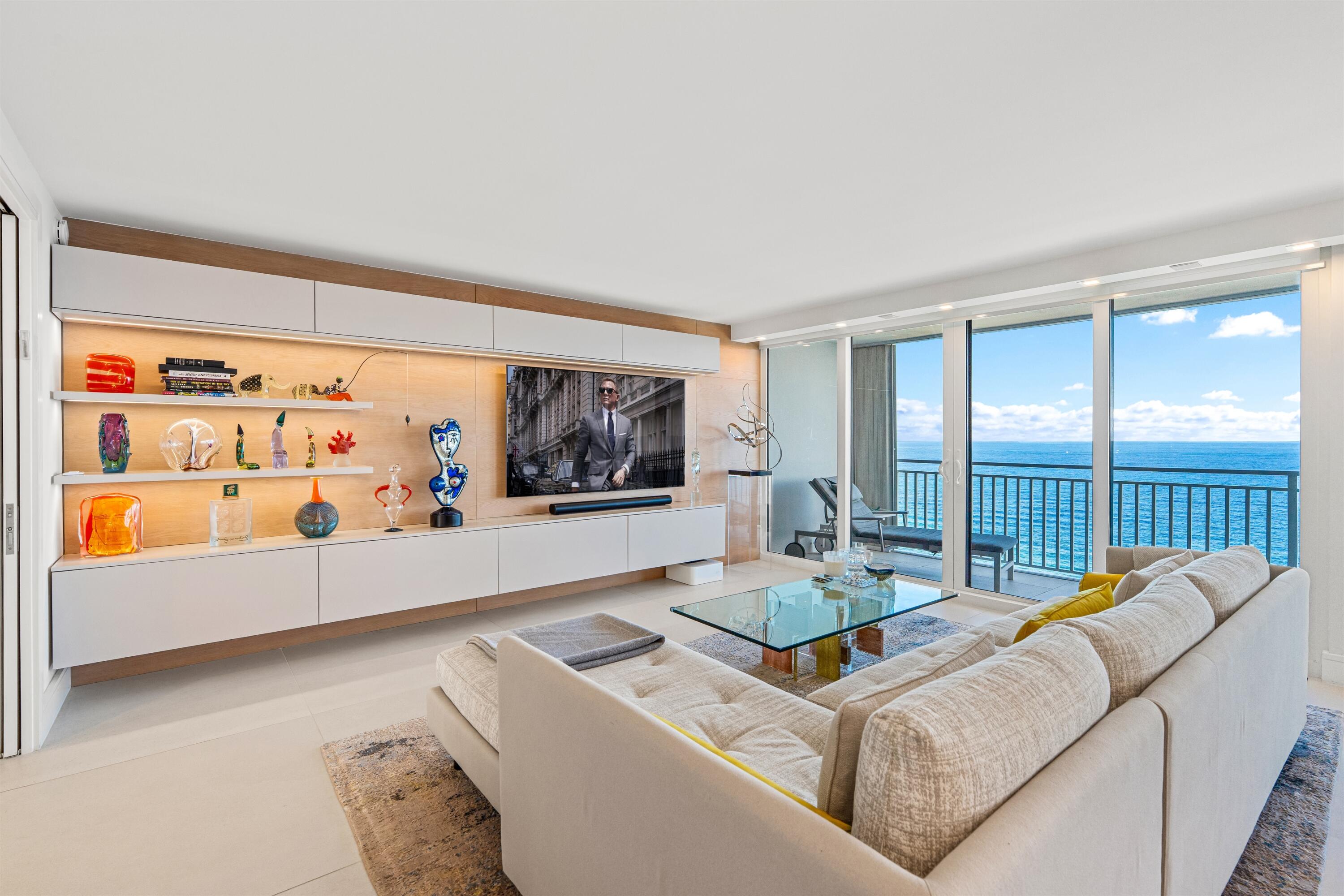2600 South Ocean Boulevard, Unit 19E Boca Raton, FL 33432 - Photo 5 of 53 a living room with furniture and a large window