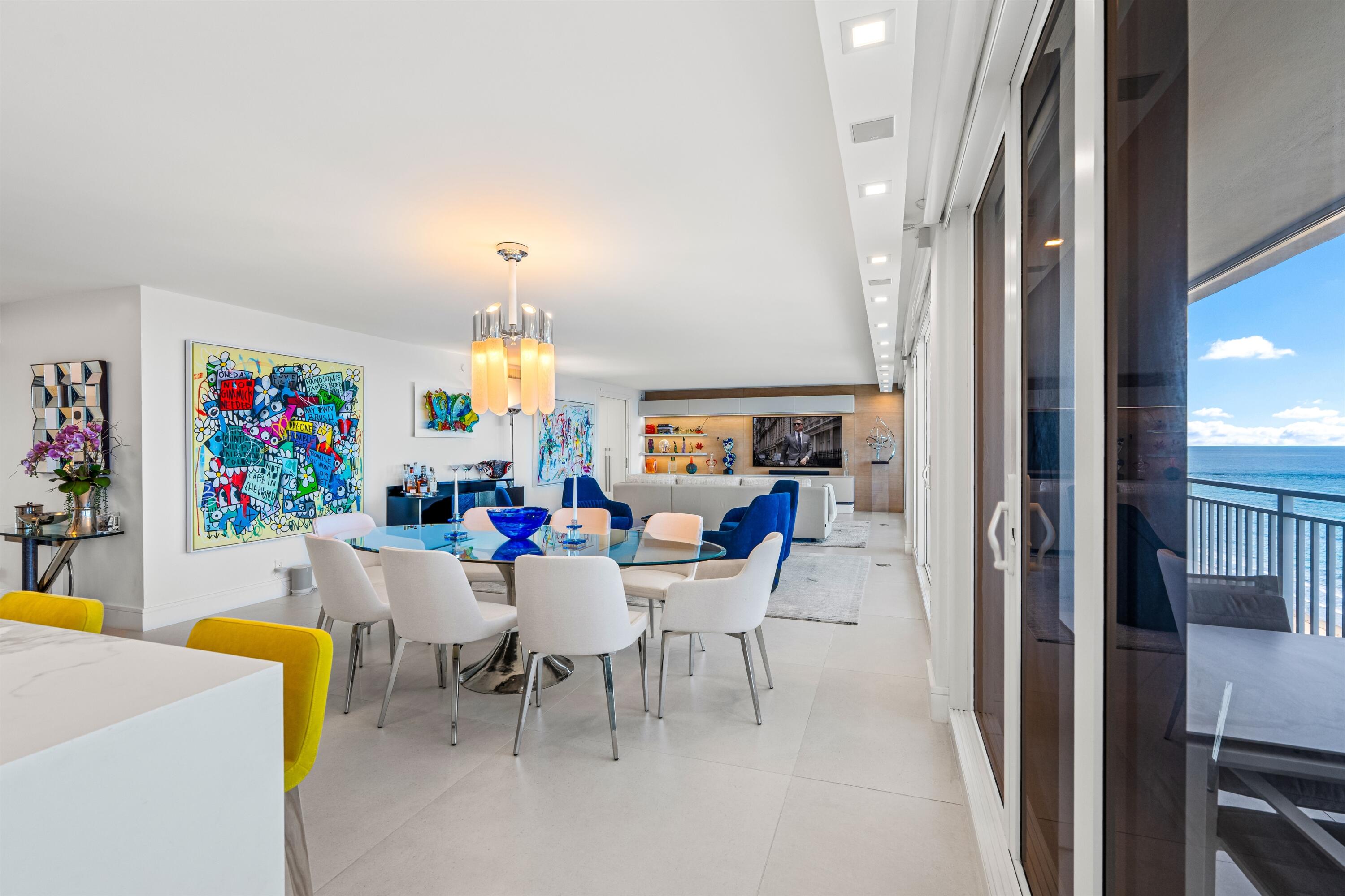 2600 South Ocean Boulevard, Unit 19E Boca Raton, FL 33432 - Photo 7 of 53 a view of a dining room with furniture and a chandelier