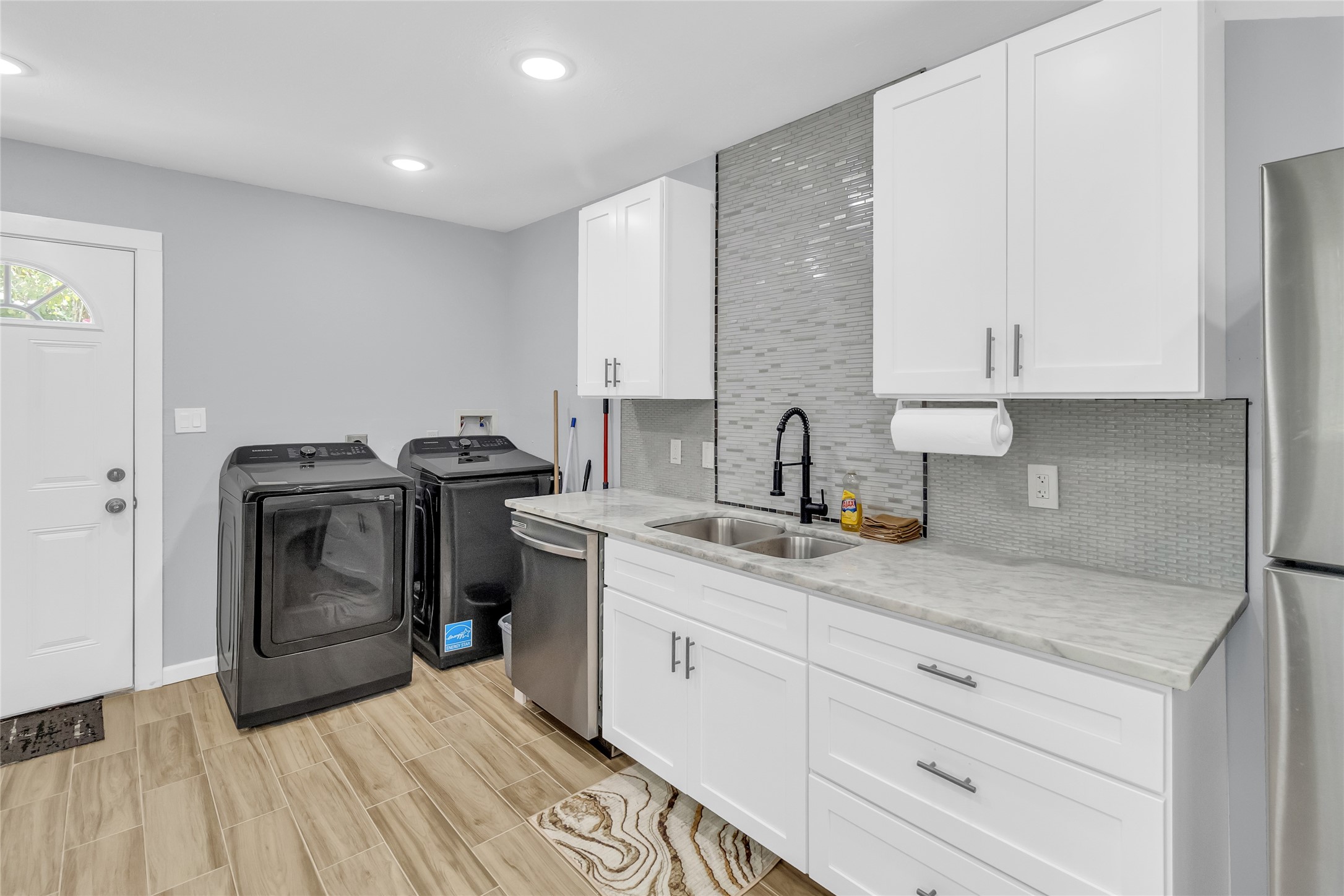 a kitchen with a stove and a sink