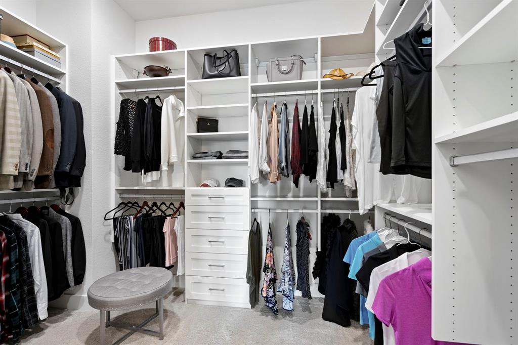 762 Corner Post Path Celina, TX 75009 - Photo 20 of 38 The primary closet has been customized by California Closets