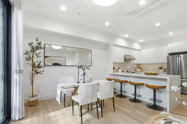 a view of a dining room with furniture