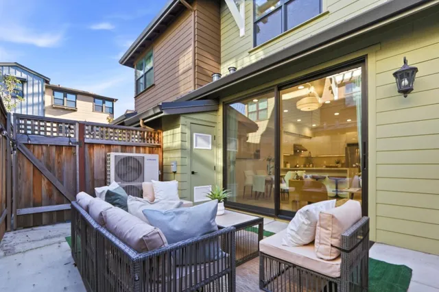 a outdoor living space with furniture and a window