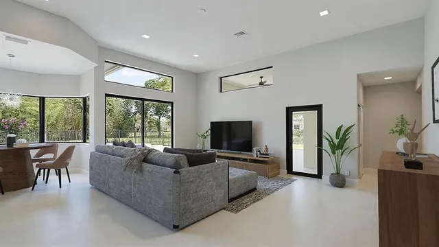 a view of a swimming pool with a patio