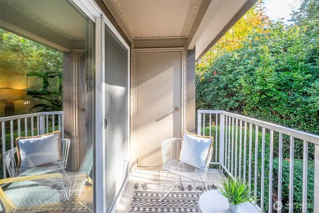 a view of a balcony with chair