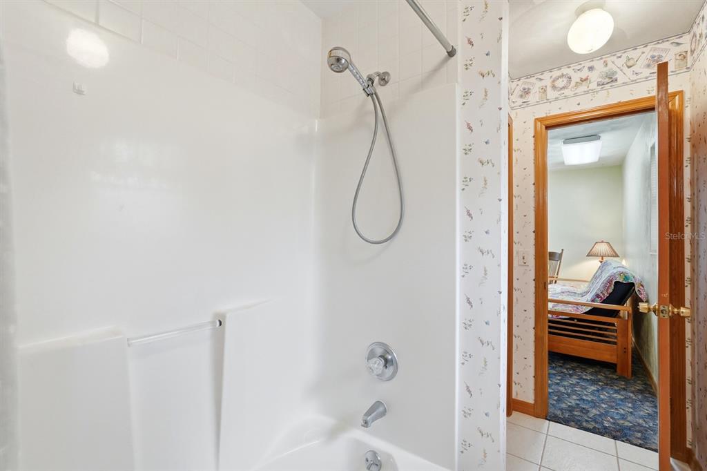 158 Cone Road Ormond Beach, FL 32174 - Photo 14 of 40 a bathroom with a shower