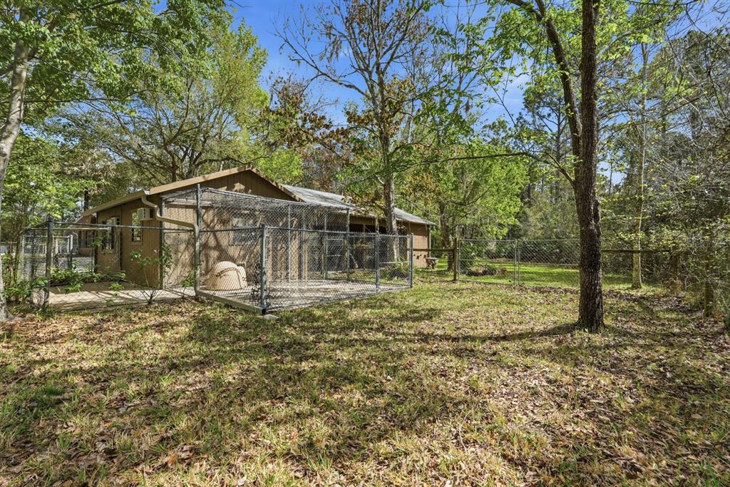 158 Cone Road Ormond Beach, FL 32174 - Photo 29 of 40 a view of a house with a yard