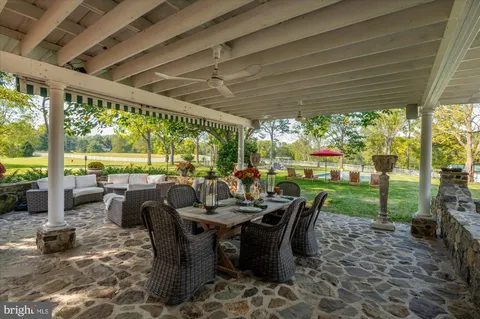 a view of a lake with a house in the background