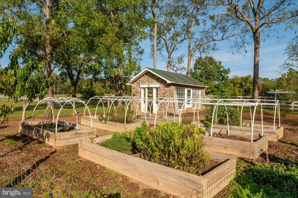 a view of house with garden