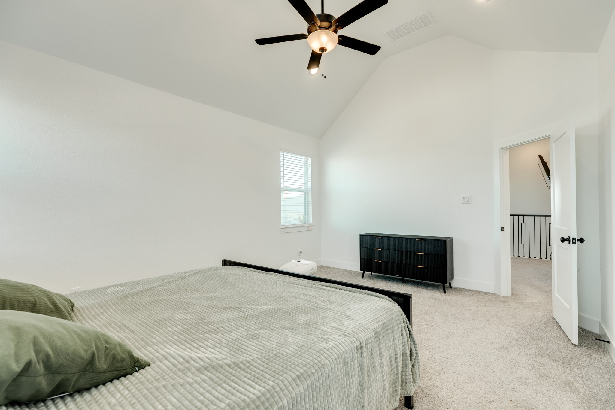 10002 Nectar Path Rosharon, TX 77583 - Photo 19 of 46 The primary bedroom is a spacious area with a backyard view.