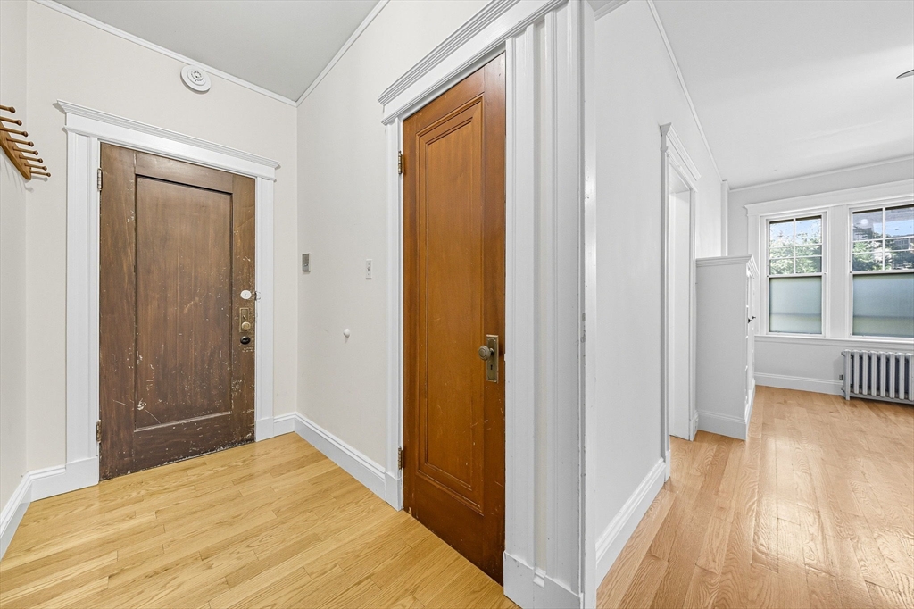 4 Crawford Street, Unit U4 Cambridge, MA 02139 - Photo 15 of 22 a view of a bedroom from a hallway