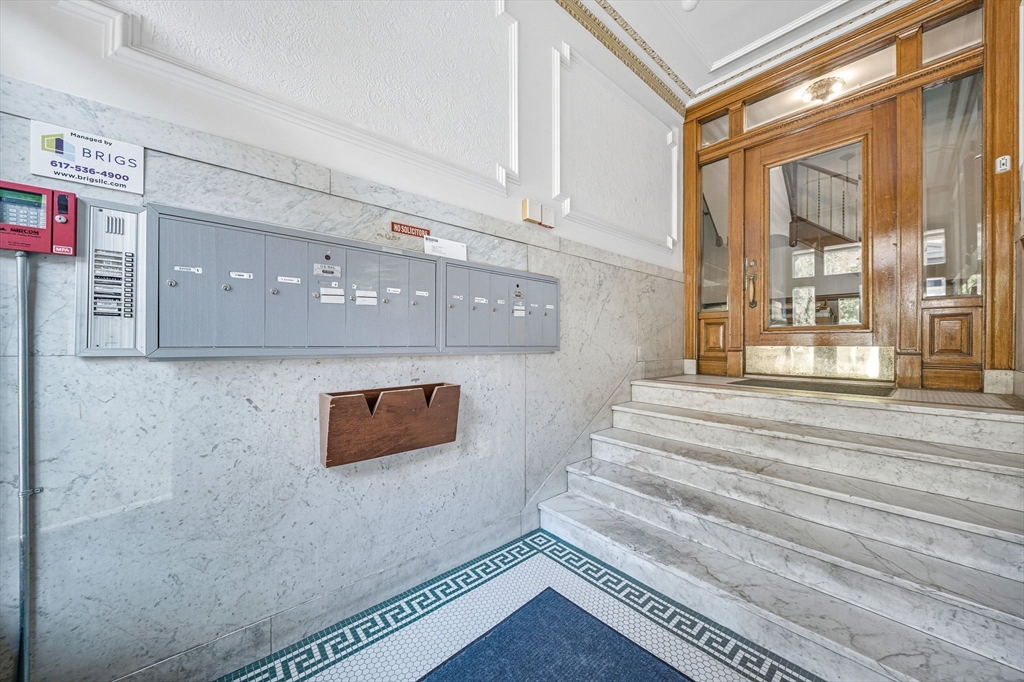4 Crawford Street, Unit U4 Cambridge, MA 02139 - Photo 18 of 22 a view of staircase with white walls