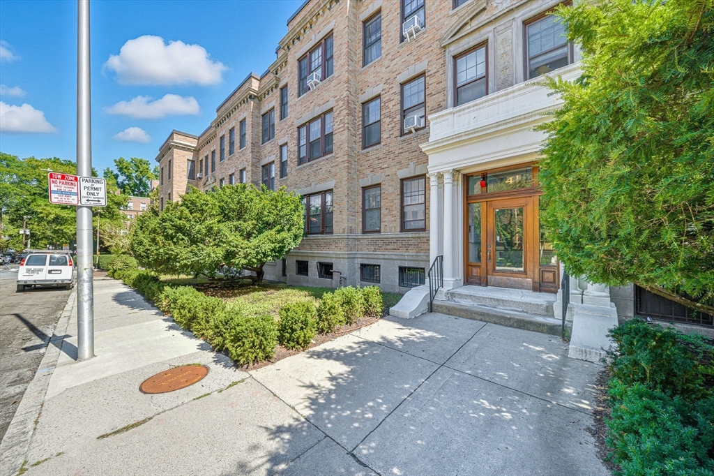 4 Crawford Street, Unit U4 Cambridge, MA 02139 - Photo 20 of 22 a front view of a building with garden