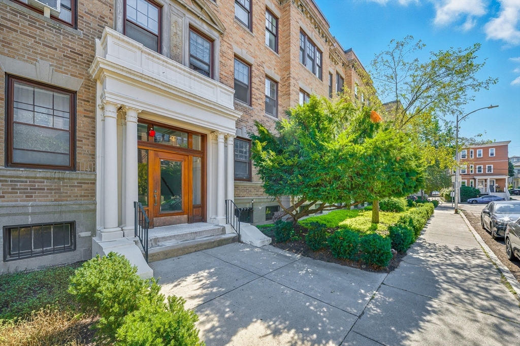 4 Crawford Street, Unit U4 Cambridge, MA 02139 - Photo 22 of 22 a front view of a building with garden