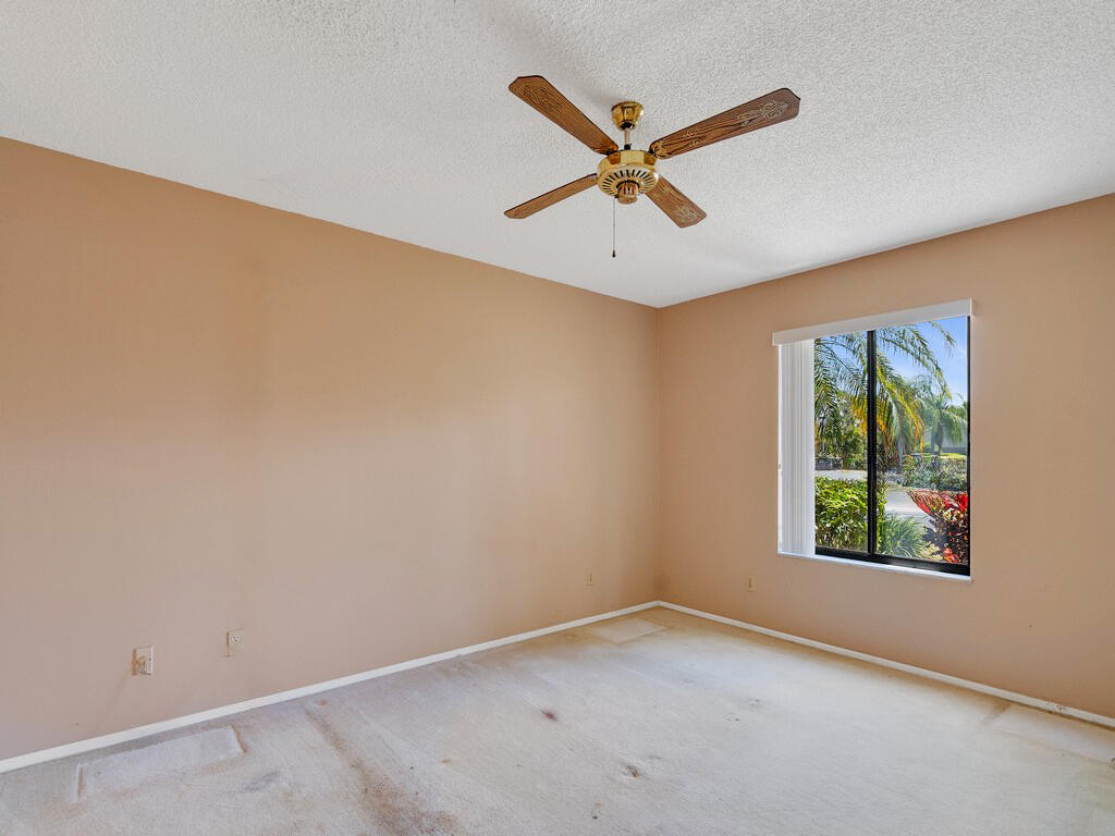 800 Northwest Fork Road, Unit 106 Stuart, FL 34994 - Photo 13 of 33 an empty room with window