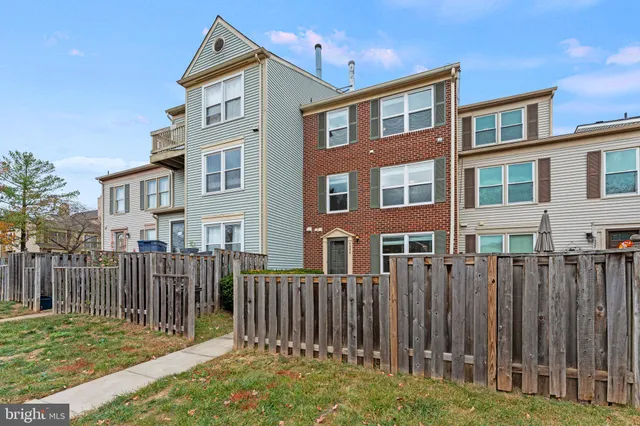 a picture of a park with a bench
