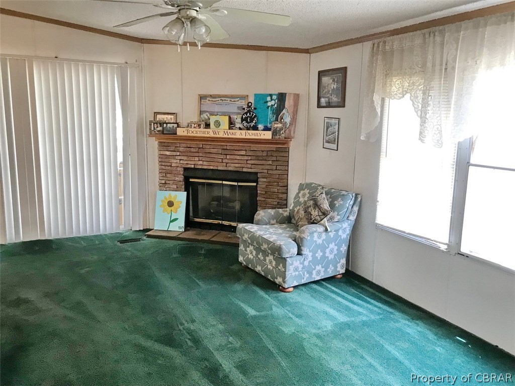 1357 Healys Road Locust Hill, VA 23092 - Photo 7 of 13 Rear living room with gas logs
