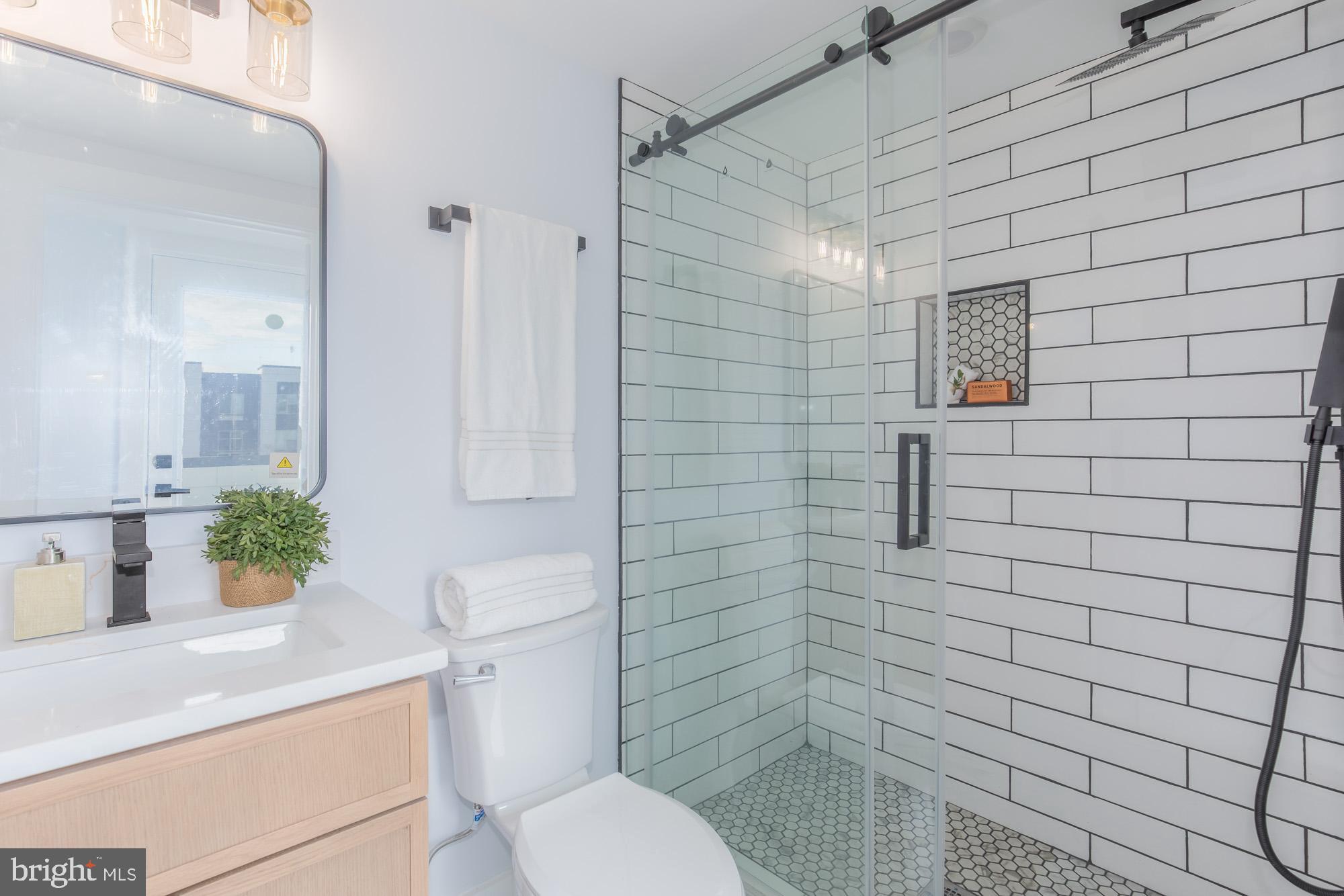 1012 17th Place Northeast, Unit SEVEN Washington, DC 20002 - Photo 16 of 19 2nd floor bathroom