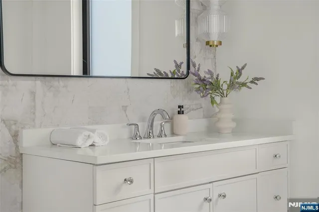 a view of a bathtub in a bathroom