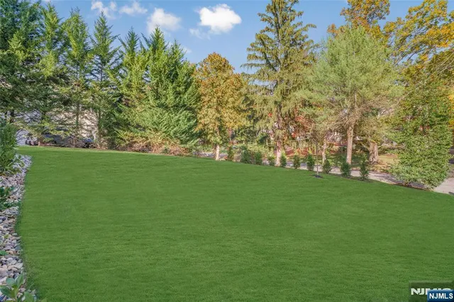 a view of a backyard with a garden