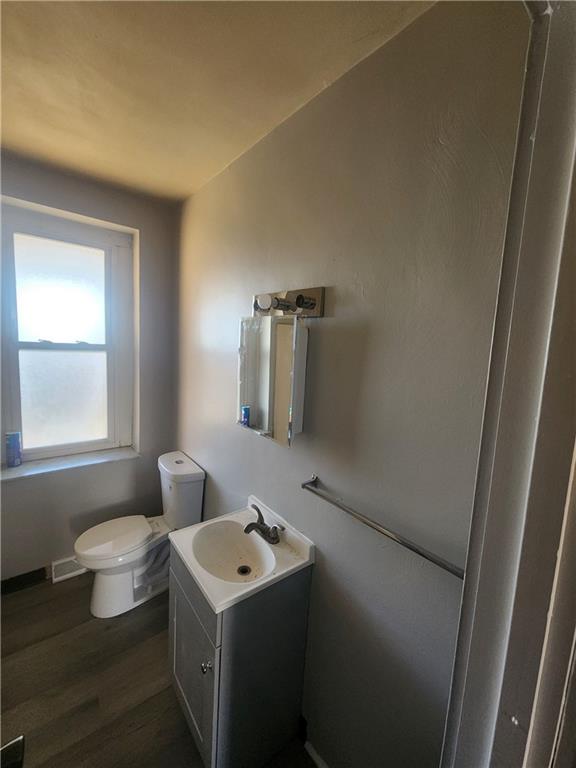 306 Campbell Street McKees Rocks, PA 15136 - Photo 11 of 28 a bathroom with a sink toilet and window