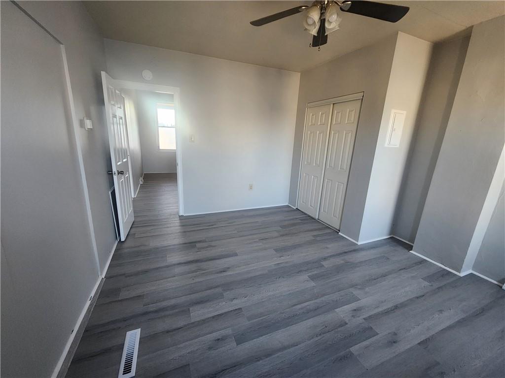 306 Campbell Street McKees Rocks, PA 15136 - Photo 15 of 28 a view of a hallway with wooden floor