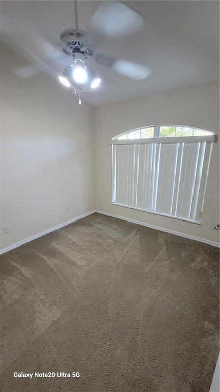 11028 Versailles Boulevard Clermont, FL 34711 - Photo 12 of 21 a view of an empty room
