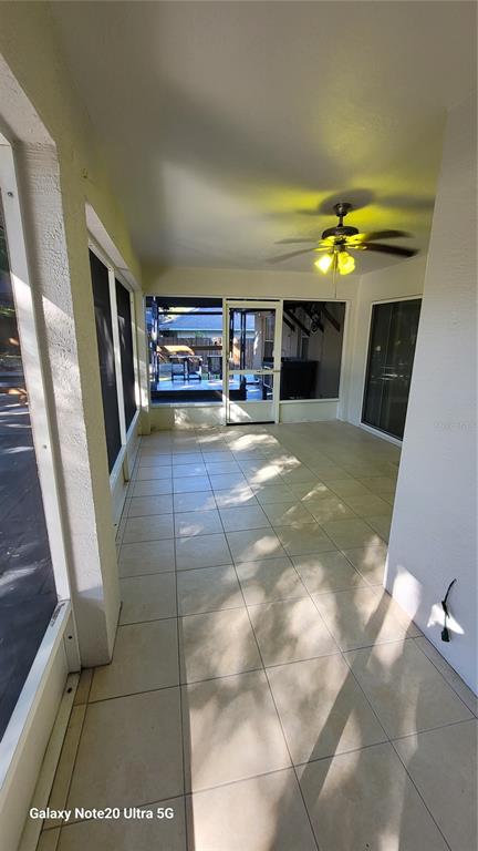 11028 Versailles Boulevard Clermont, FL 34711 - Photo 17 of 21 a view of a livingroom with furniture and a fireplace