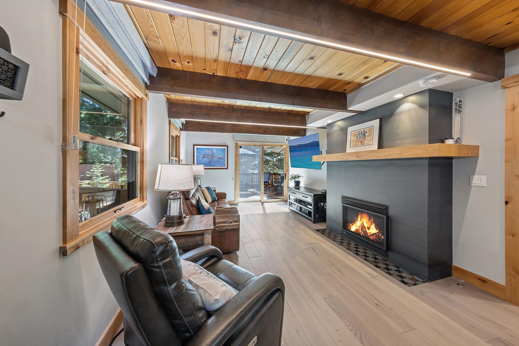 4530 Muletail Drive Carnelian Bay, CA 96140 - Photo 3 of 24 a living room with furniture and a fireplace