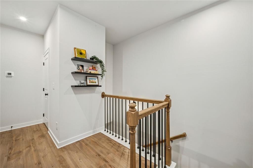 1332 Stanley Park Drive Decatur, GA 30033 - Photo 34 of 75 a view of a hallway with wooden floor